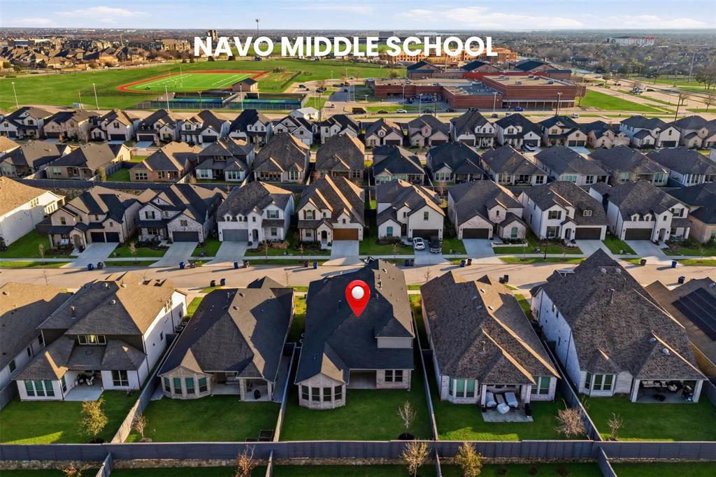 537 Oakmoss Street Little Elm, TX 76227 - Photo 28 of 39 an aerial view of a house with a swimming pool yard and outdoor seating