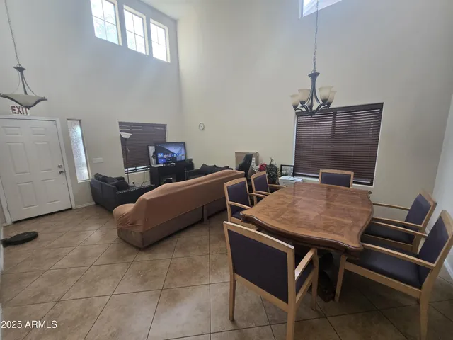 a bed room with a bed and furniture