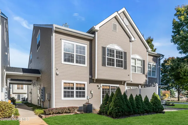 a view of house with yard