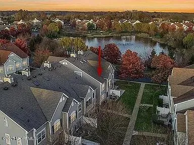 an aerial view of a house having outdoor seating