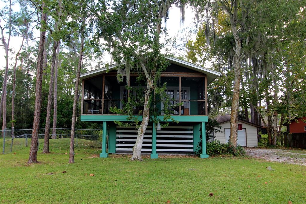 14712 Henson Road Orlando, FL 32832 - Photo 1 of 32 a view of a house with backyard
