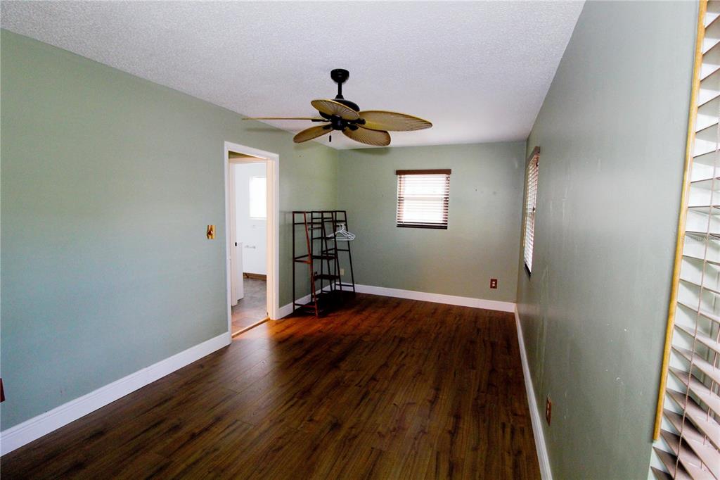14712 Henson Road Orlando, FL 32832 - Photo 18 of 32 wooden floor in an empty room with a window