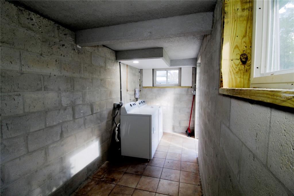14712 Henson Road Orlando, FL 32832 - Photo 23 of 32 a bathroom with a sink and a mirror
