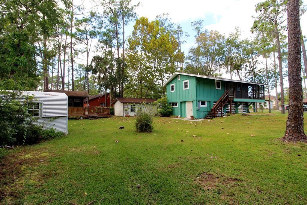 14712 Henson Road Orlando, FL 32832 - Photo 32 of 32 a front view of a house with garden
