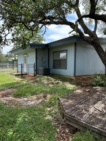 a house view with a garden space