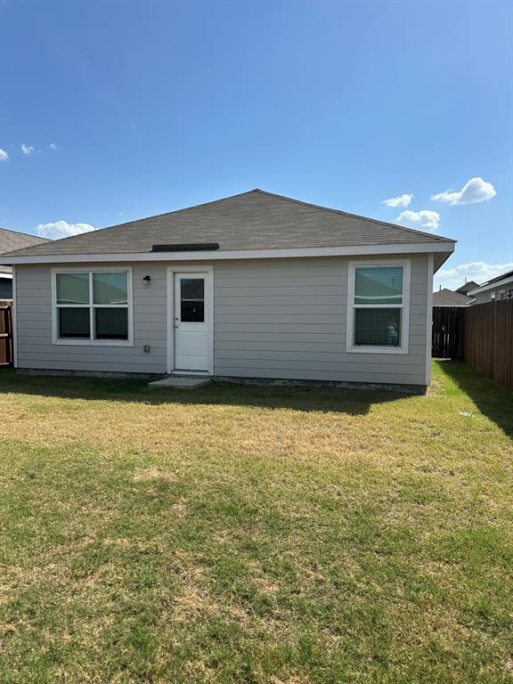 5906 Nyquist Way Forney, TX 75126 - Photo 25 of 27 Back of property featuring a shingled roof
