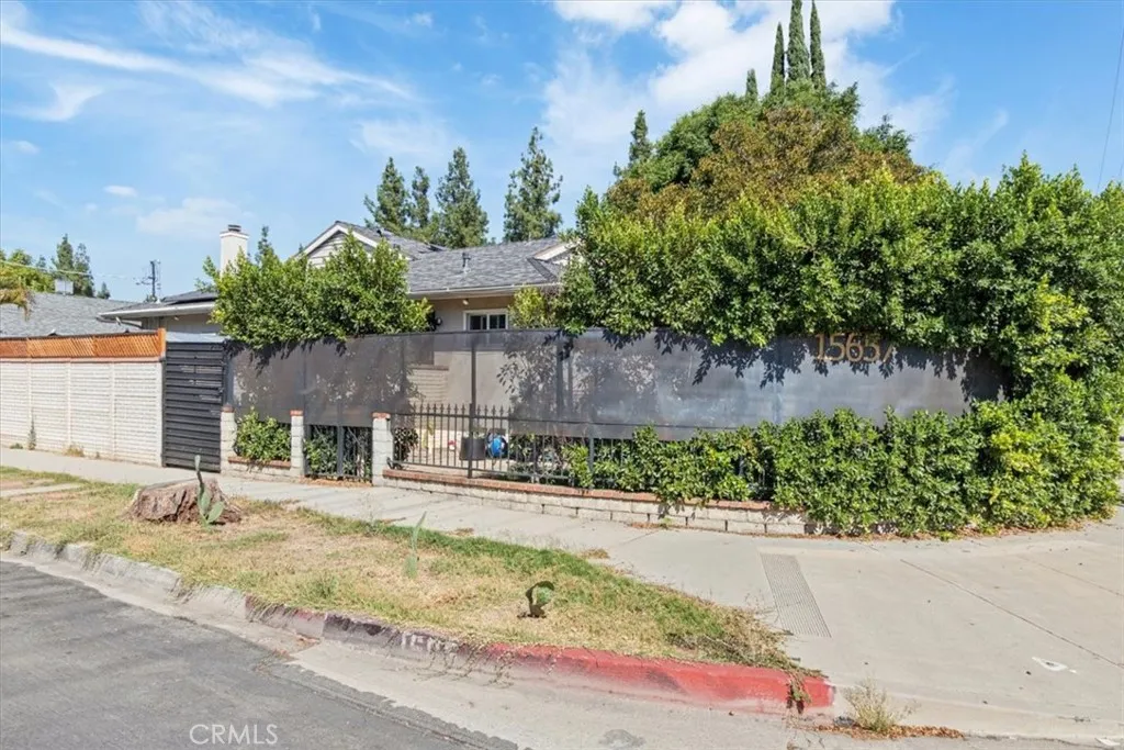 15657 Devonshire Street Granada Hills, CA 91344 - Photo 37 of 39 a view of a backyard with a sitting area