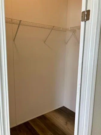 a view of small space with racks on the wall