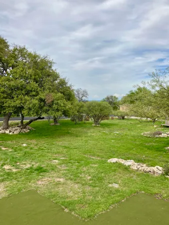 a view of an ocean from a yard