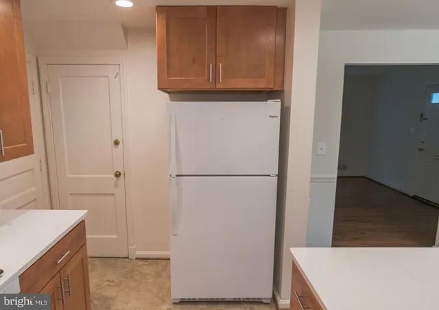 a kitchen with a sink and a window