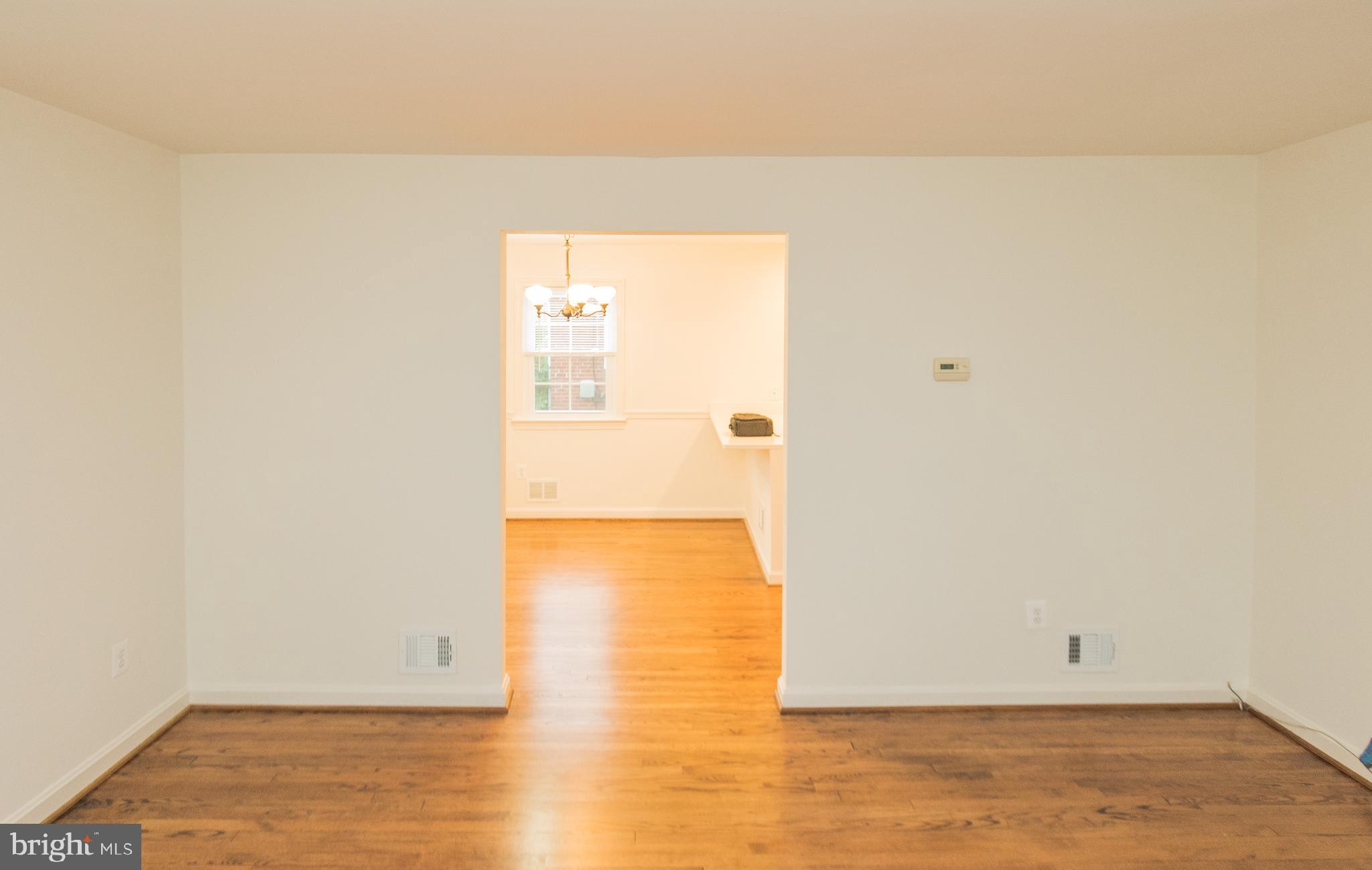1613 Neely Road Silver Spring, MD 20903 - Photo 4 of 53 a view of an empty room