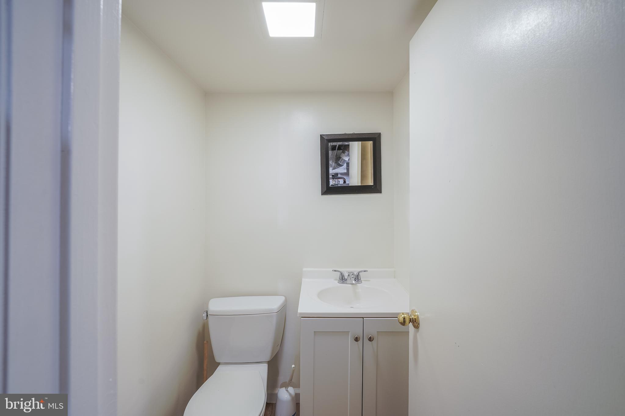 1613 Neely Road Silver Spring, MD 20903 - Photo 43 of 53 a bathroom with a toilet