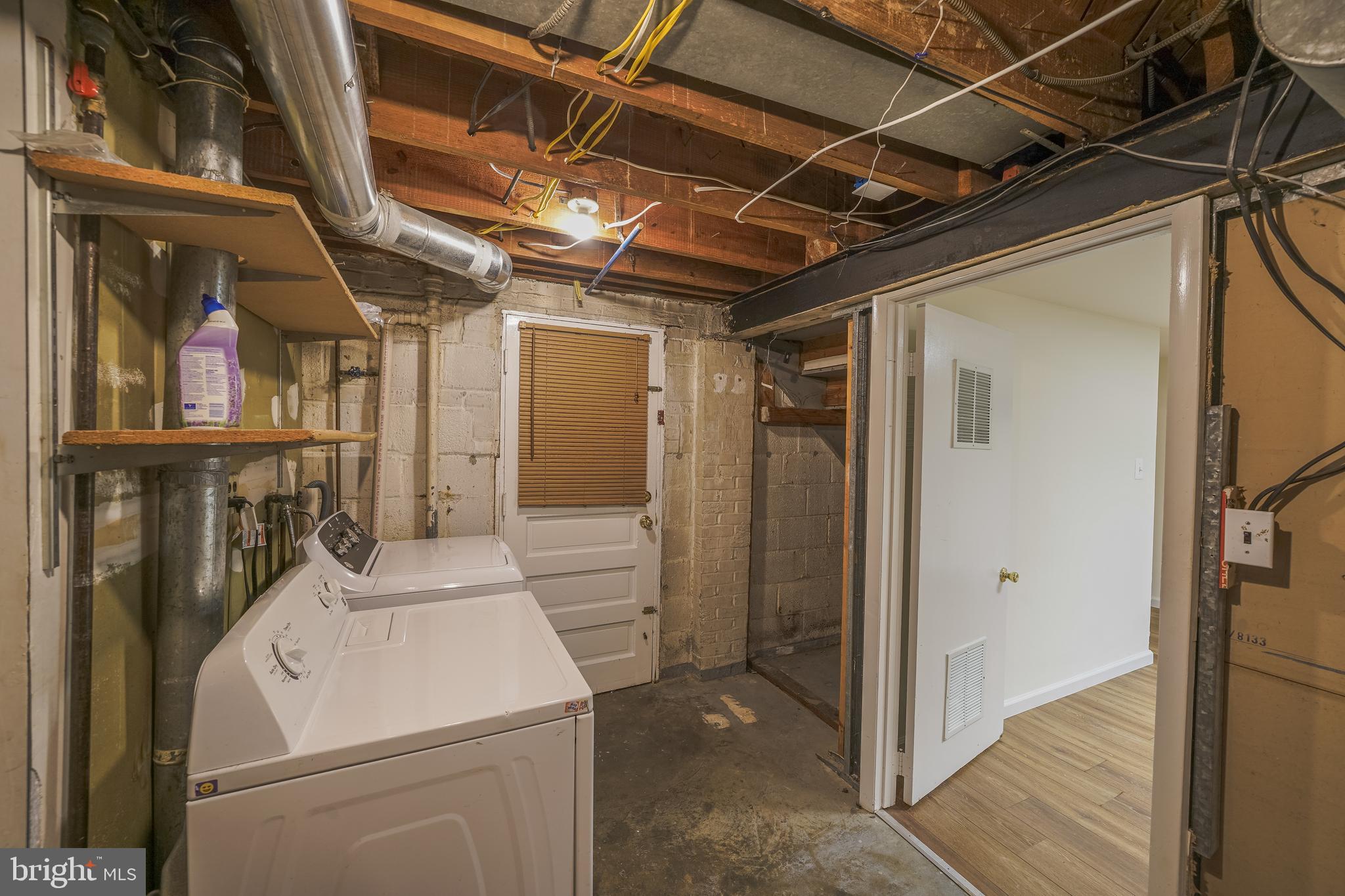 1613 Neely Road Silver Spring, MD 20903 - Photo 45 of 53 a view of storage and utility room
