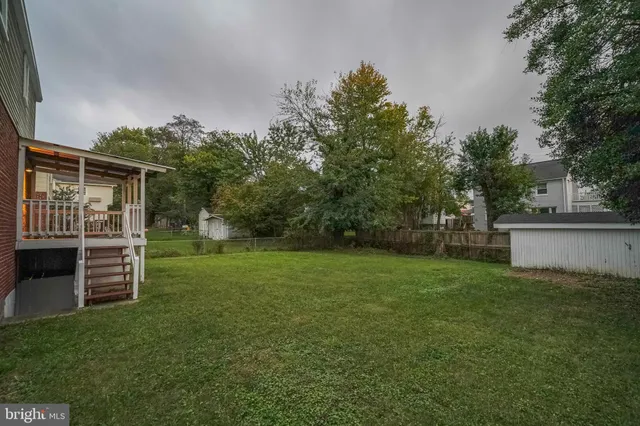 a front view of building with yard