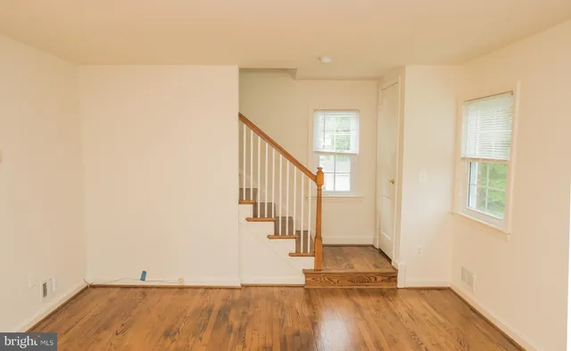 a view of entryway with wooden floor