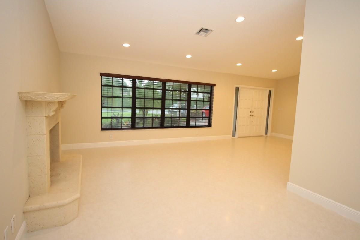 1660 Southwest 8th Avenue Boca Raton, FL 33486 - Photo 2 of 26 Living Room w/ Fireplace