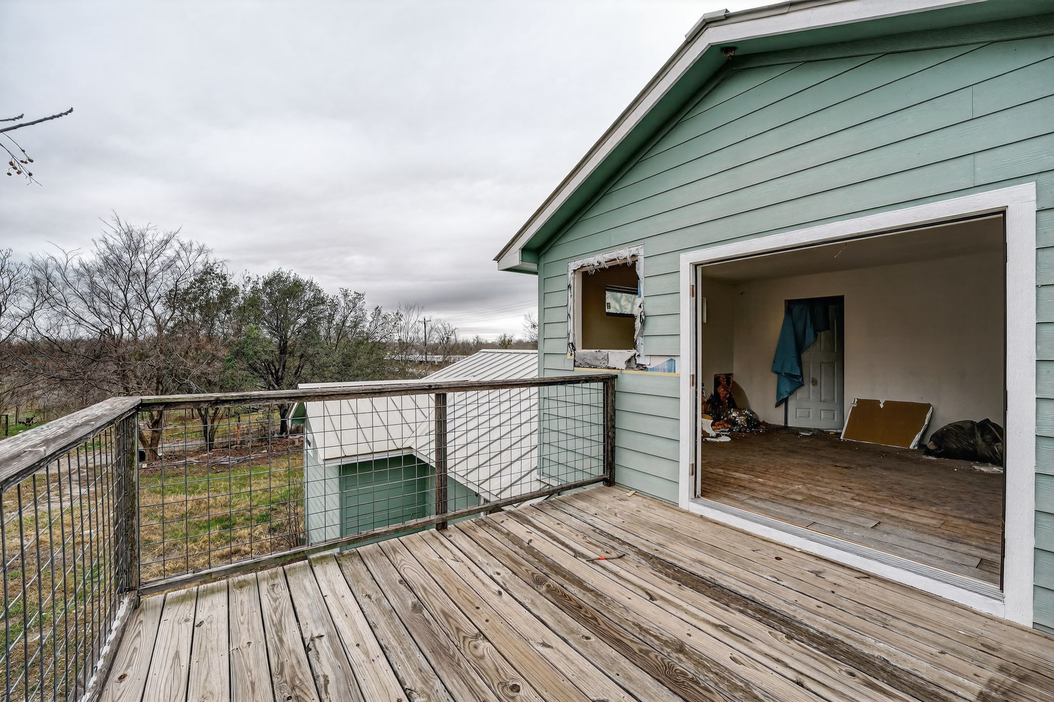 11223 Tom Sassman Road Austin, TX 78747 - Photo 15 of 40 View of wooden deck