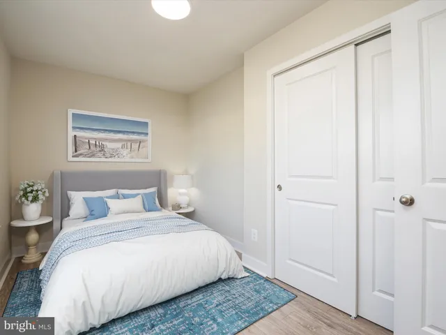 a bathroom with a sink a toilet and a shower