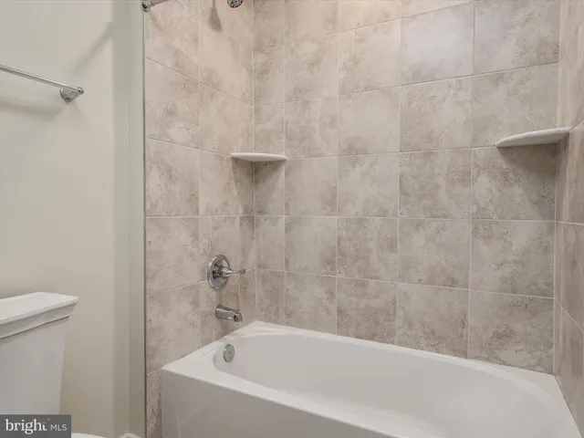 a view of a hallway with staircase