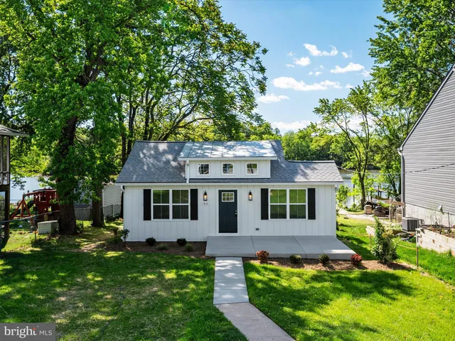 an aerial view of a house with a garden