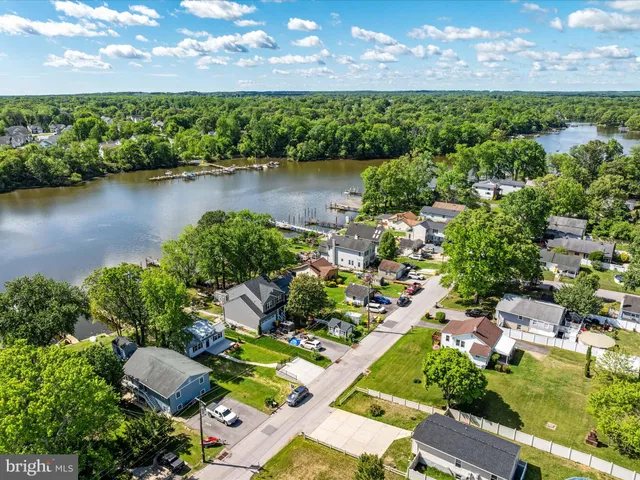 a view of a lake with a house