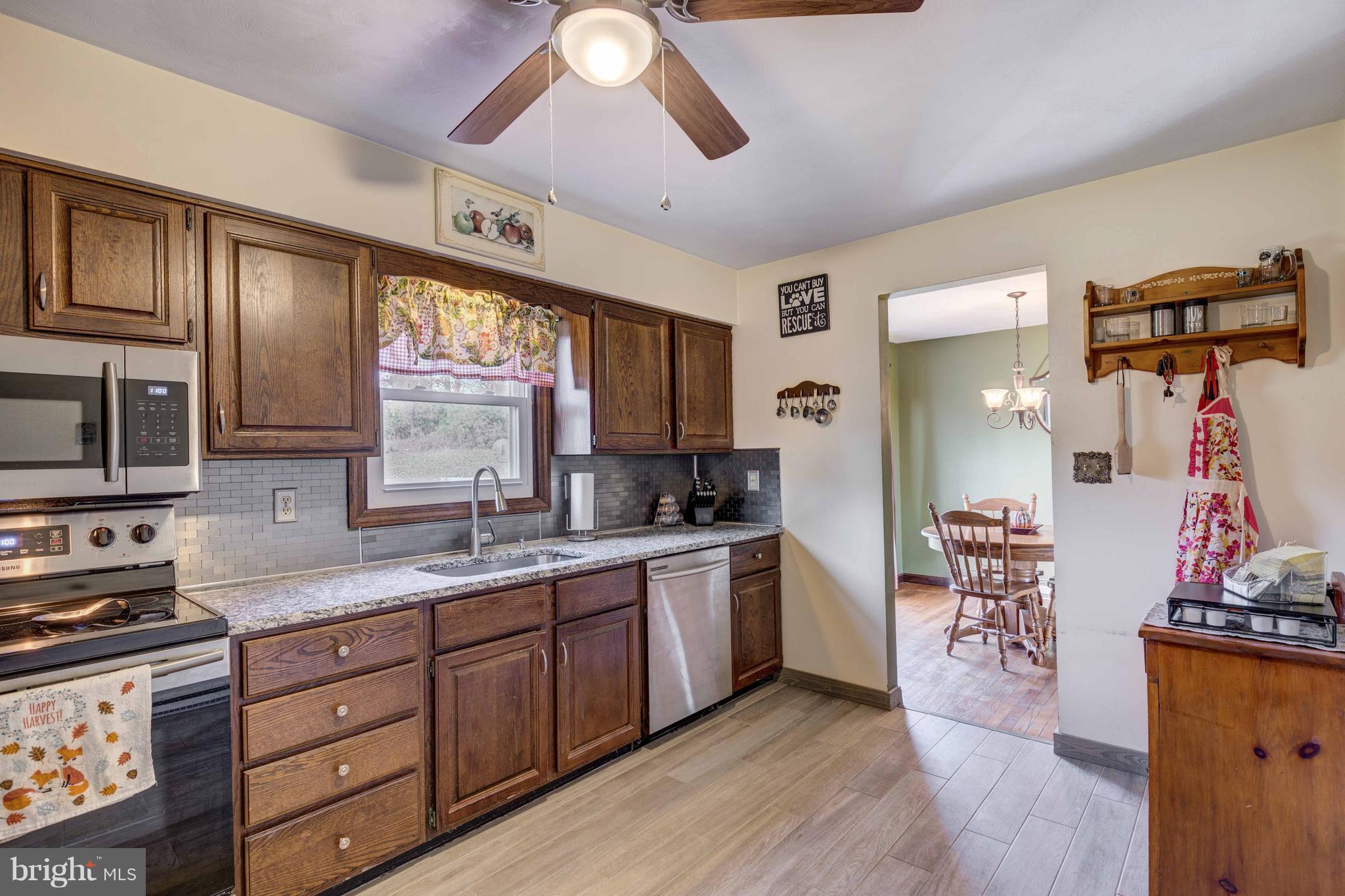 11642 Simmons Road Taneytown, MD 21787 - Photo 14 of 29 Kitchen with new Granite and Ceramic Tile