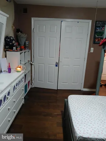 a view of water heater room with a fireplace