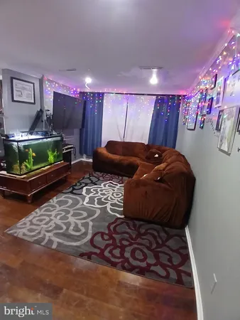 a bed room with furniture and a rug