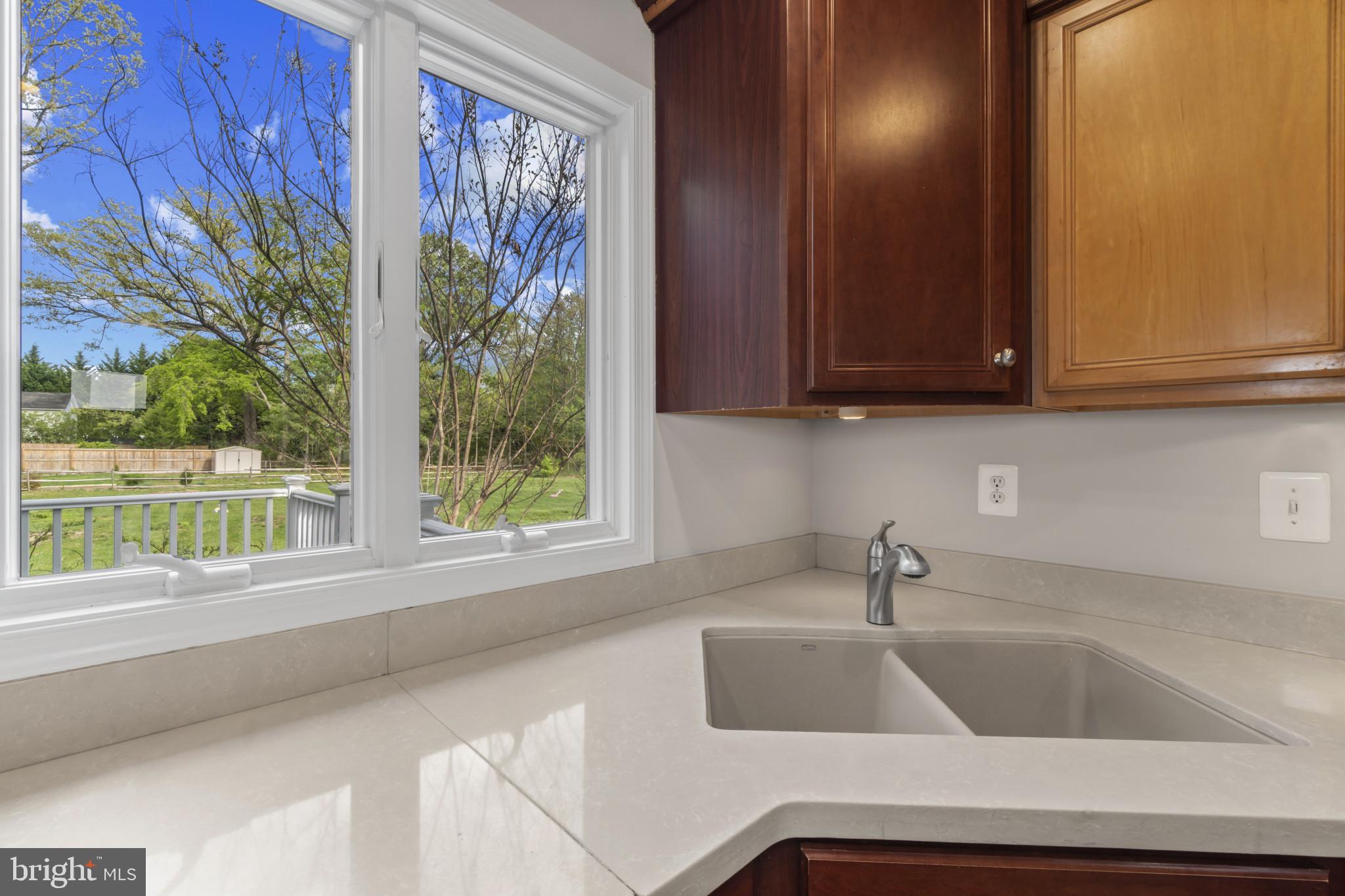 1609 Turkey Point Road Essex, MD 21221 - Photo 12 of 41 a sink sitting next to a window