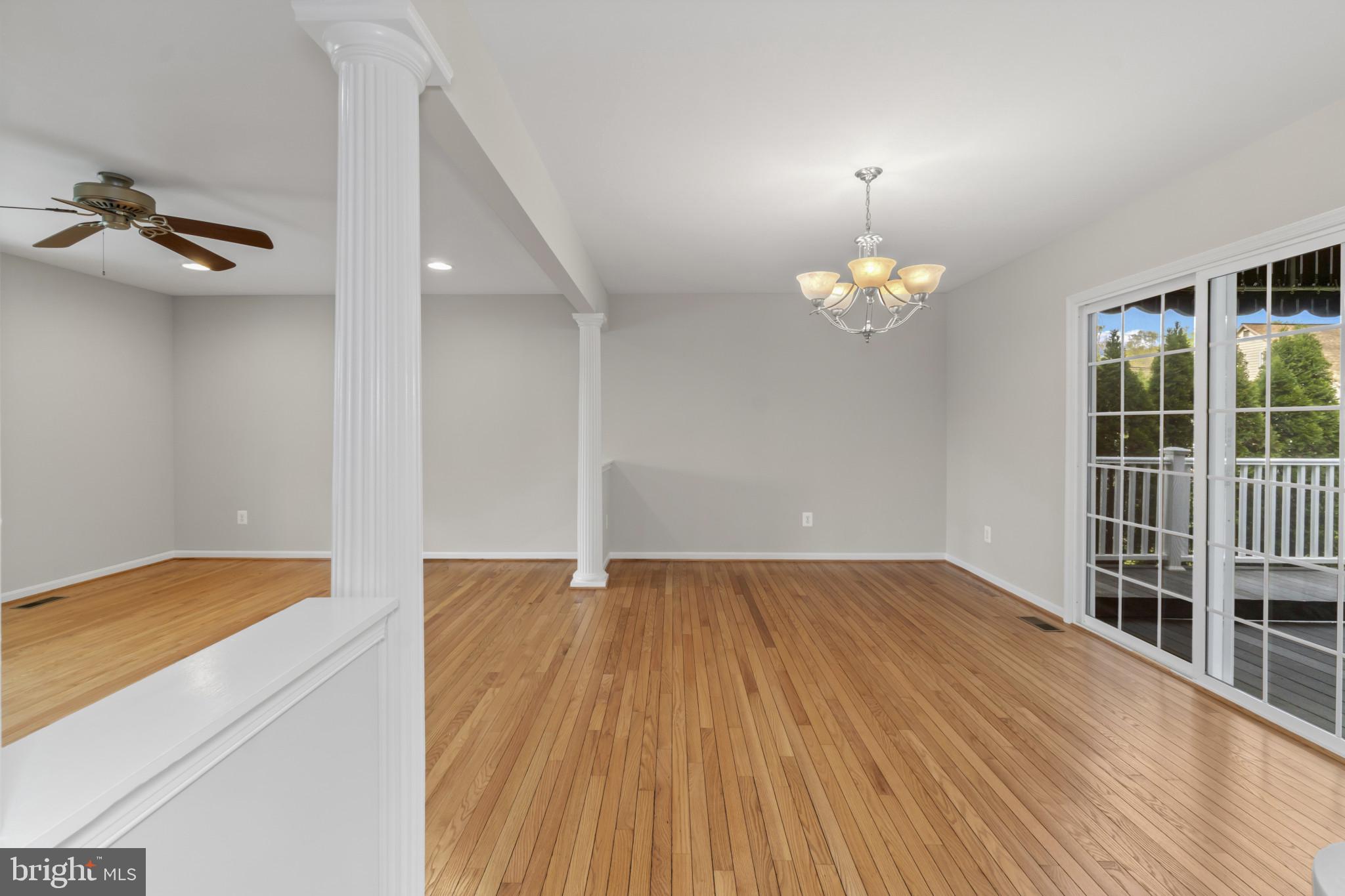 1609 Turkey Point Road Essex, MD 21221 - Photo 13 of 41 wooden floor in an empty room with a window