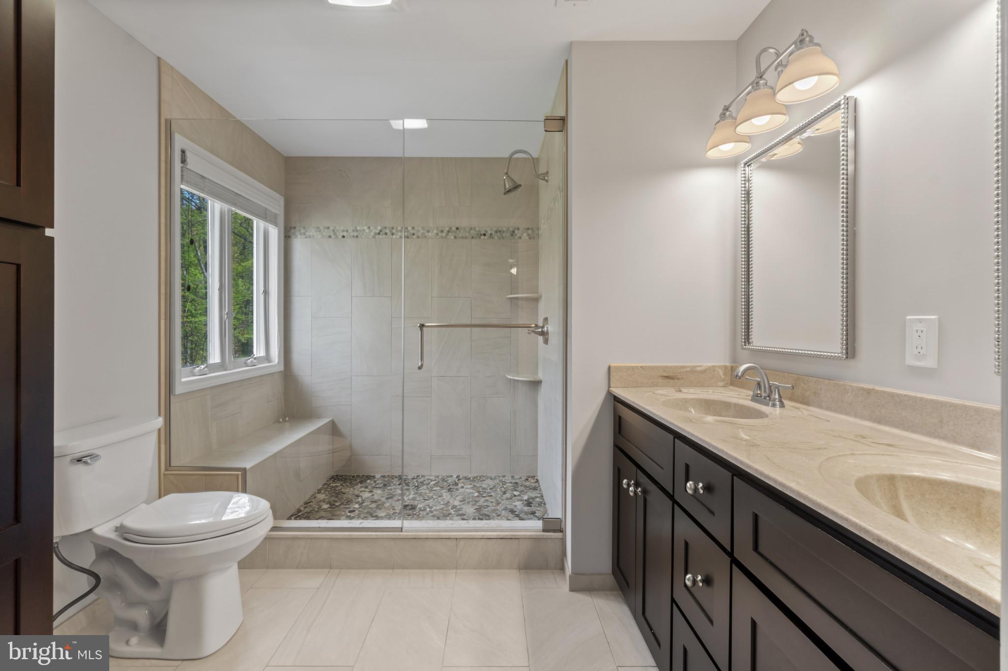 1609 Turkey Point Road Essex, MD 21221 - Photo 20 of 41 a bathroom with a sink a toilet and shower
