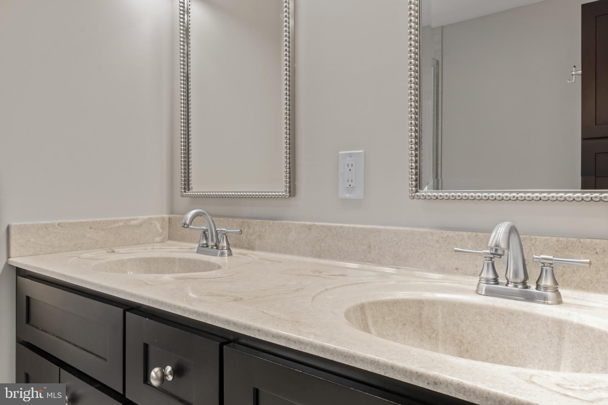 1609 Turkey Point Road Essex, MD 21221 - Photo 21 of 41 a bathroom with a sink and a mirror