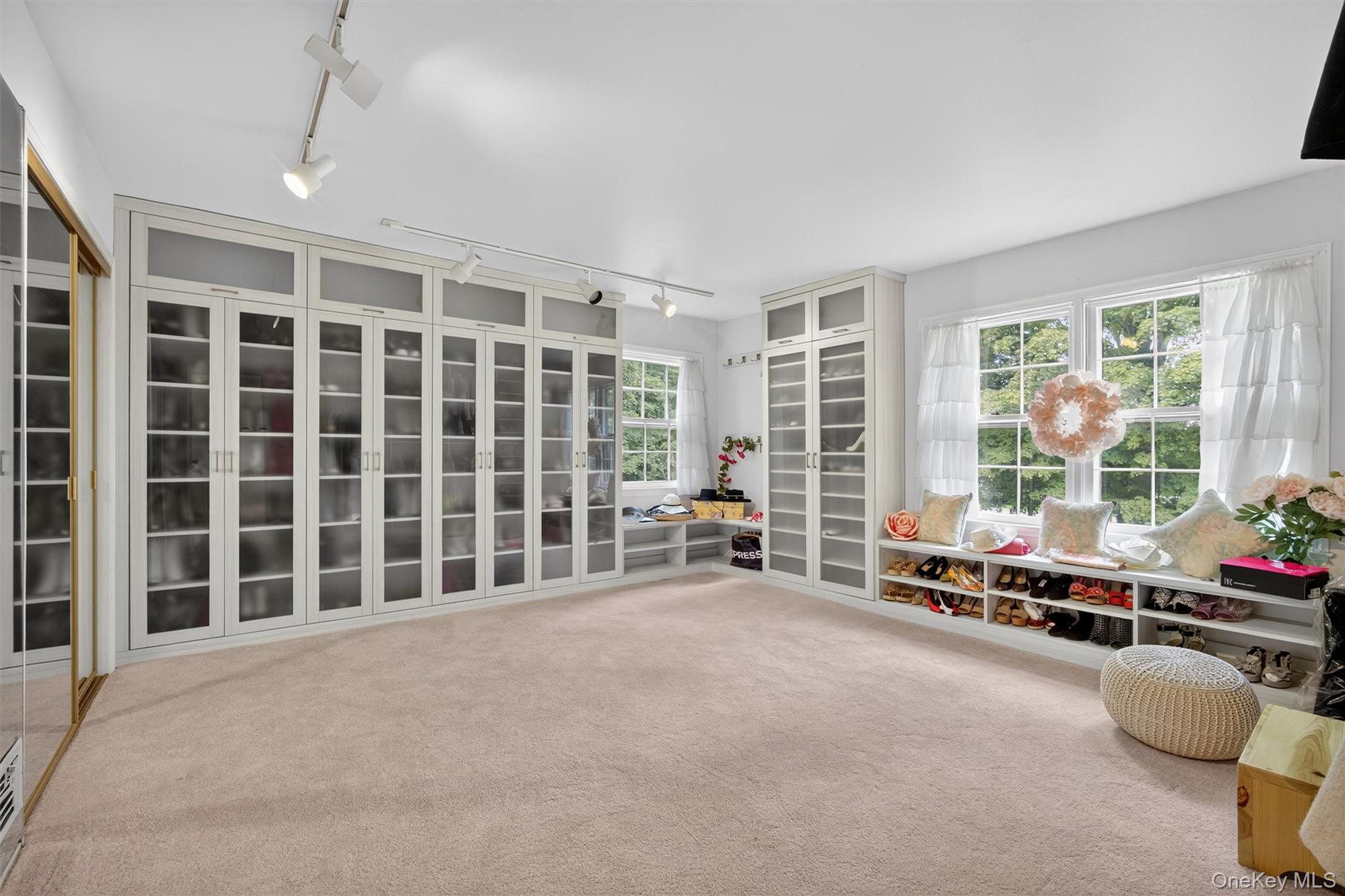 27 Orchard Hill Road Katonah, NY 10536 - Photo 30 of 38 a view of an empty room with furniture and windows