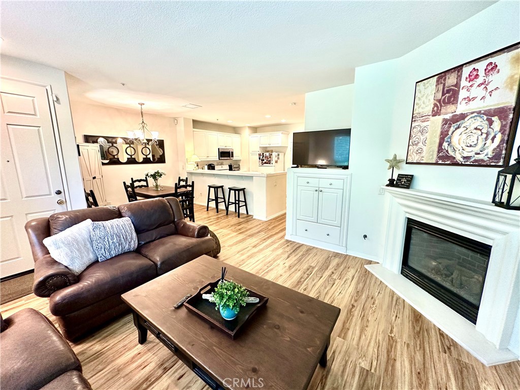 12 Martino Ladera Ranch, CA 92694 - Photo 4 of 17 a living room with furniture fireplace and flat screen tv