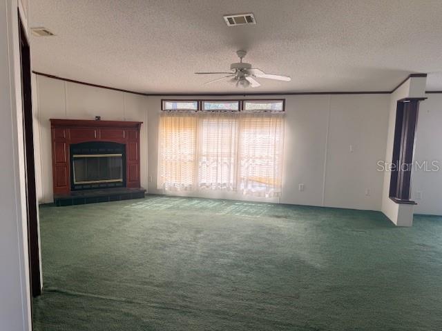 16636 Southwest 45th Street Ocala, FL 34481 - Photo 4 of 21 a view of an empty room with a fireplace and a window