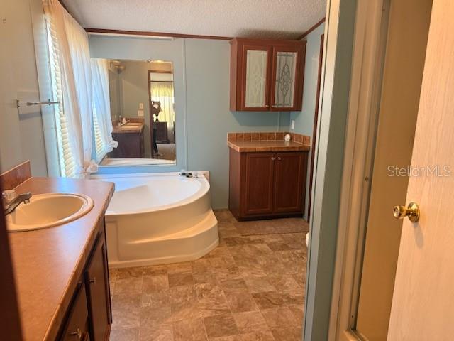 16636 Southwest 45th Street Ocala, FL 34481 - Photo 7 of 21 a bathroom with a sink toilet and shower