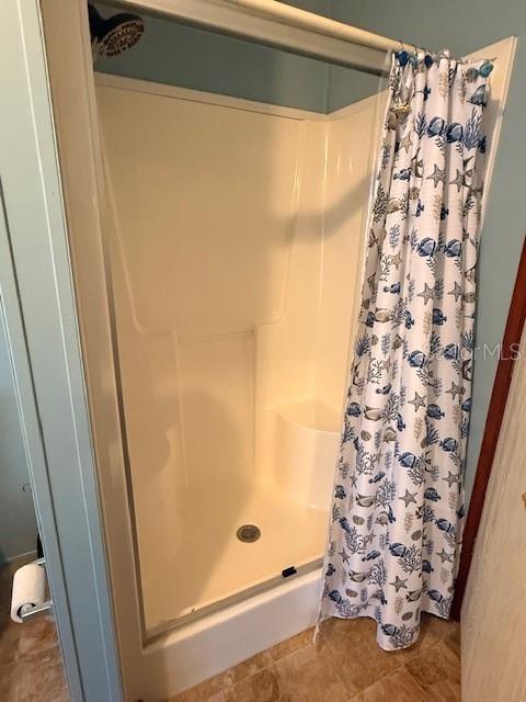 16636 Southwest 45th Street Ocala, FL 34481 - Photo 9 of 21 a bathroom with a shower and a toilet