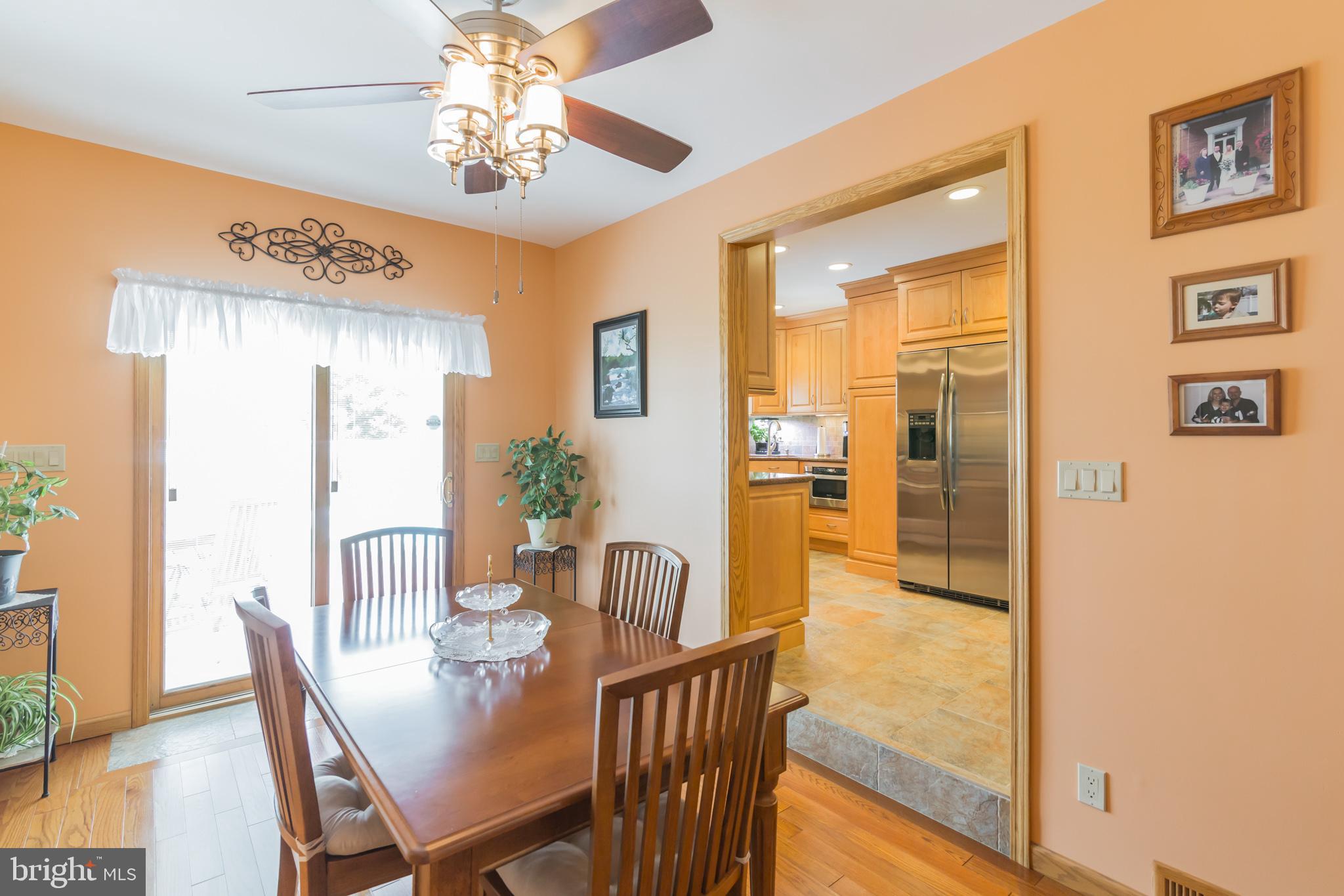 14 Mill Bend Road Hamilton, NJ 08690 - Photo 6 of 26 Step down from the kitchen into the cozy dining rm