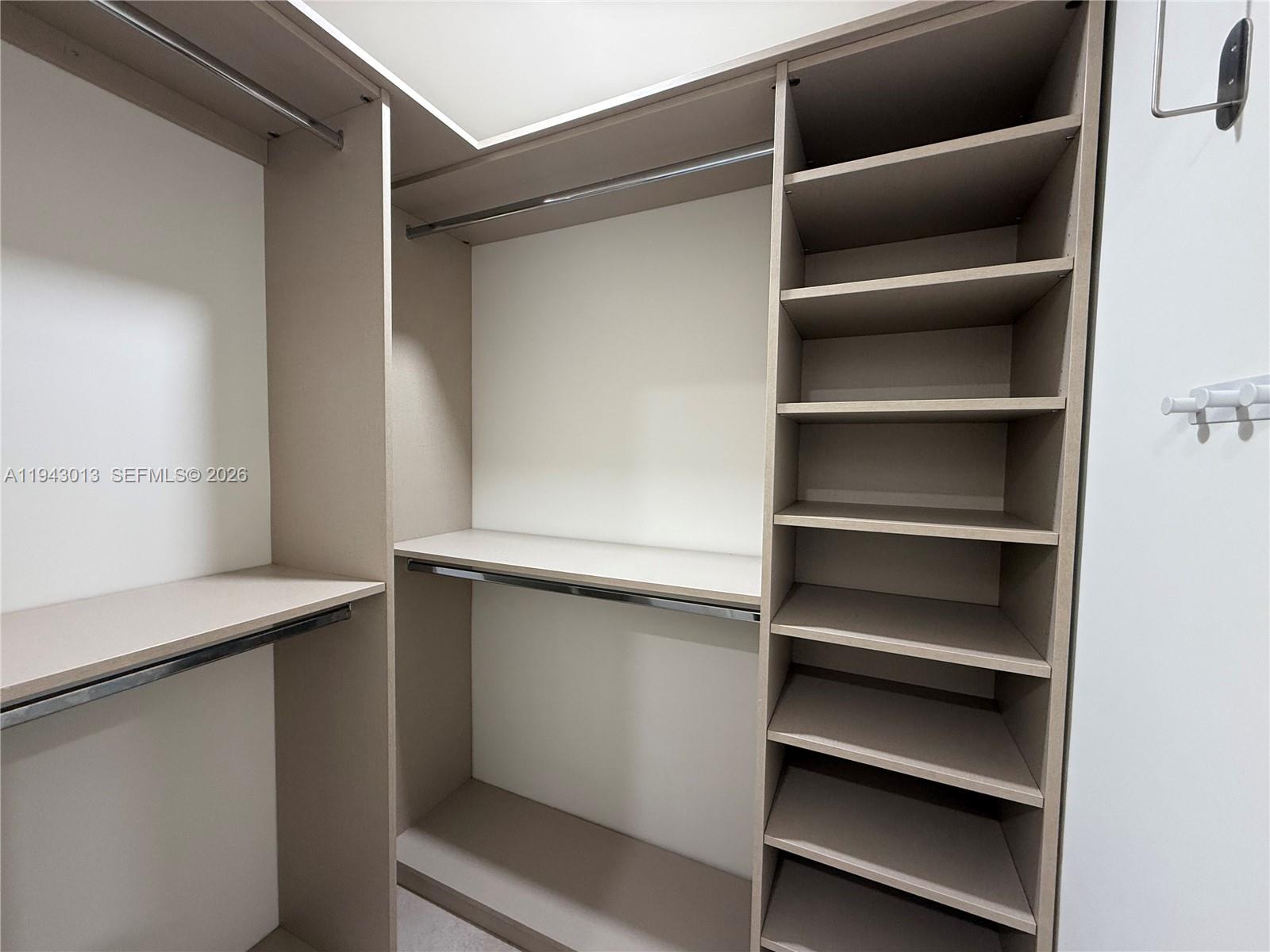 9208 Southwest 132nd Street Miami, FL 33176 - Photo 11 of 24 a view of an empty walk in closet