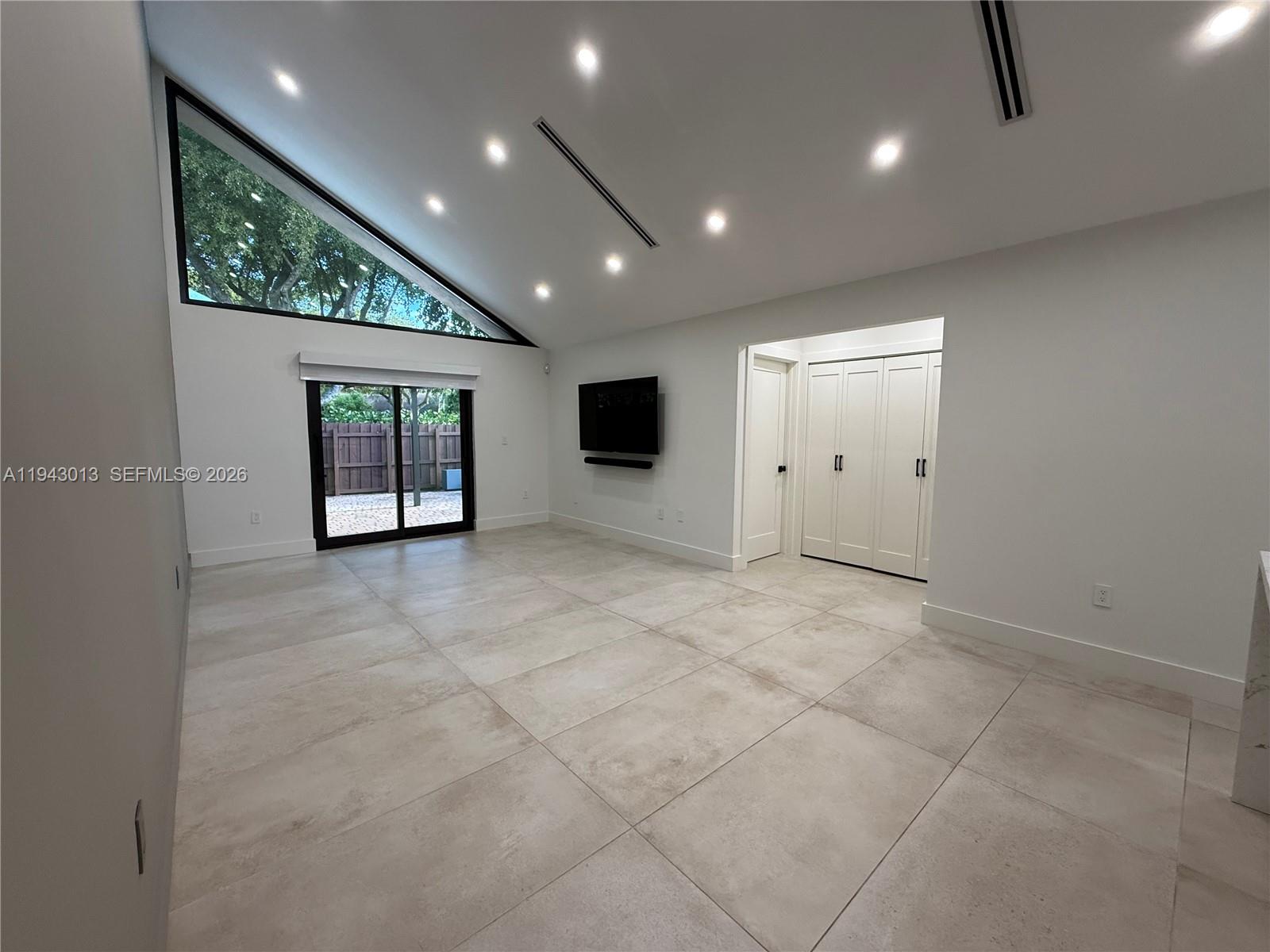 9208 Southwest 132nd Street Miami, FL 33176 - Photo 2 of 24 a view of an empty room with a window