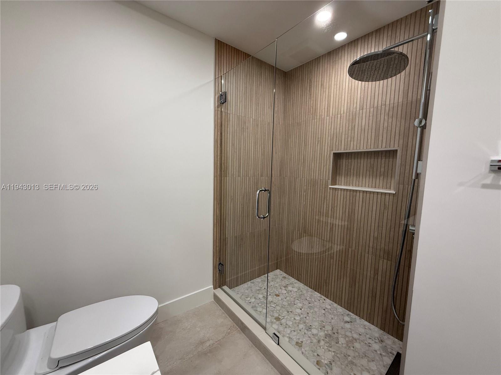 9208 Southwest 132nd Street Miami, FL 33176 - Photo 10 of 24 a bathroom with a sink and a toilet