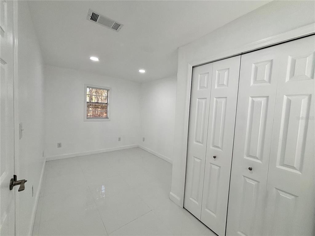 124 Coronado Road, Unit B DeBary, FL 32713 - Photo 6 of 18 a view of an empty room