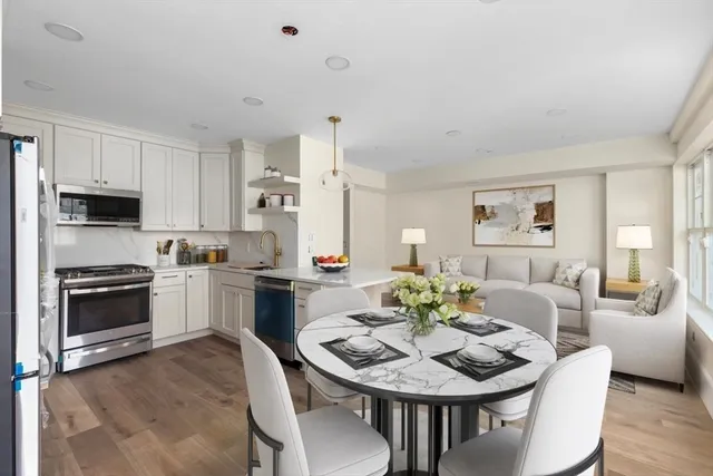 a living room with furniture and a stove
