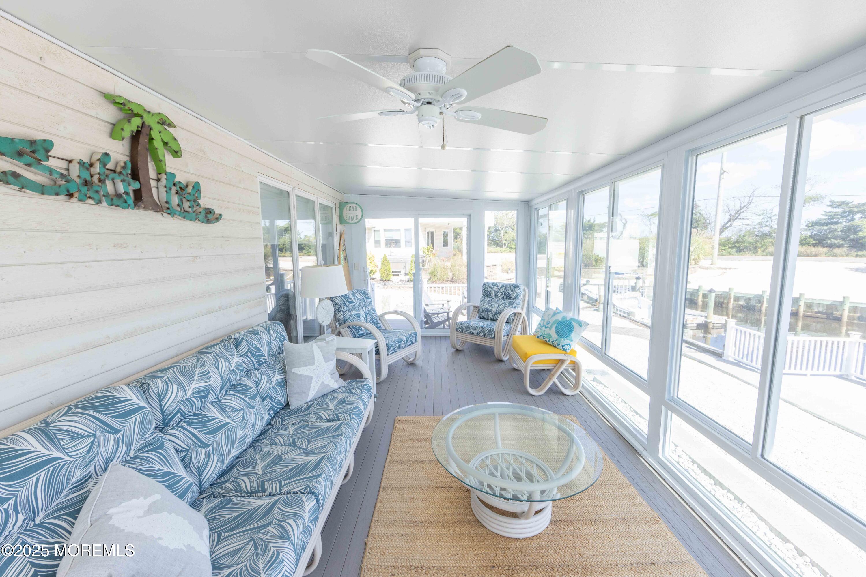5 Hunter Drive Little Egg Harbor, NJ 08087 - Photo 35 of 76 a living room with furniture and a chandelier