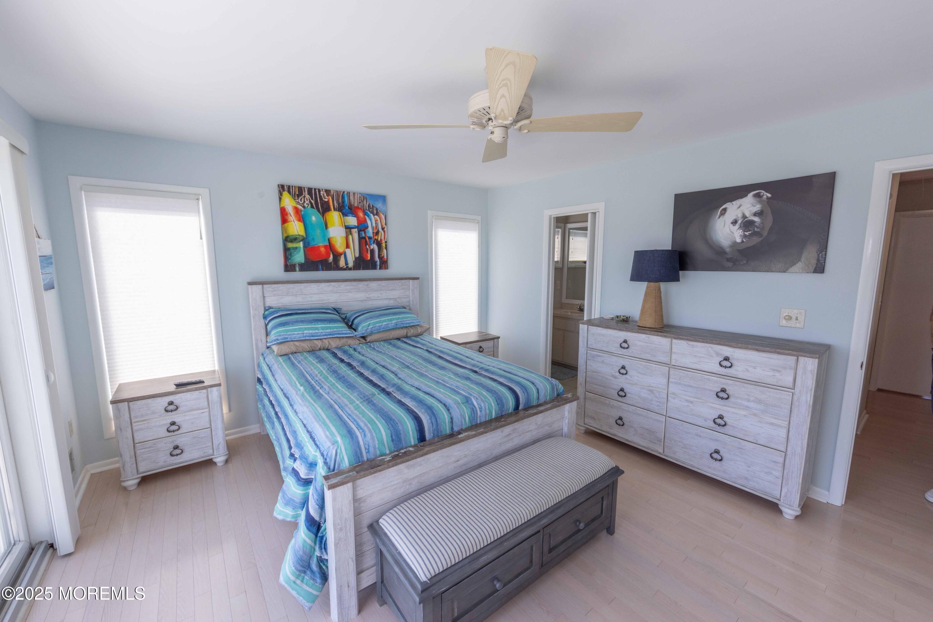 5 Hunter Drive Little Egg Harbor, NJ 08087 - Photo 39 of 76 a bedroom with a bed and a dresser in it