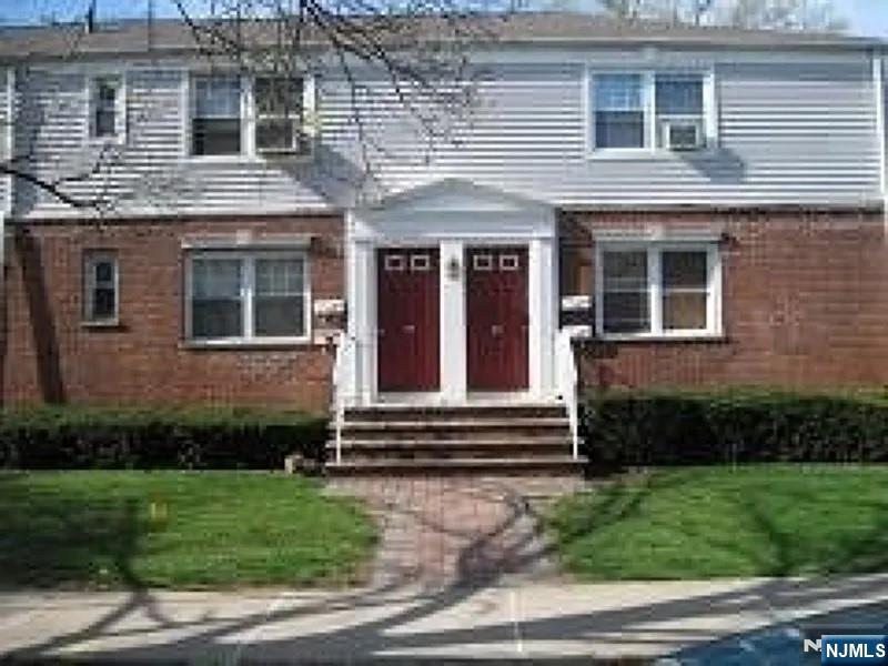 79 Hastings Avenue, Unit B Rutherford, NJ 07070 - Photo 1 of 1 a view of a house with brick walls