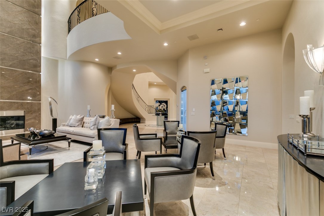 4 Awbrey Court Henderson, NV 89052 - Photo 12 of 72 Building lobby with recessed lighting, a towering ceiling, and crown molding