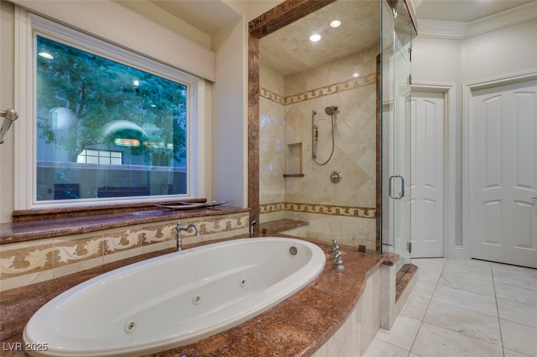 4 Awbrey Court Henderson, NV 89052 - Photo 40 of 72 Bathroom with a shower stall and a jetted tub