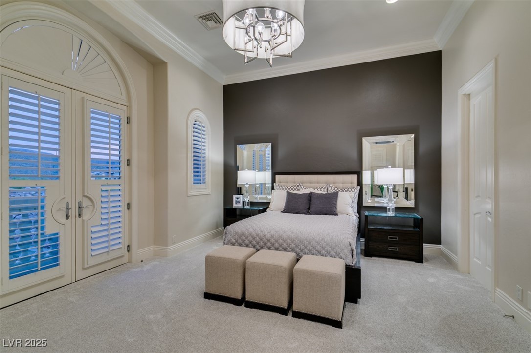 4 Awbrey Court Henderson, NV 89052 - Photo 42 of 72 Carpeted bedroom with french doors, ornamental molding, access to outside, and a chandelier