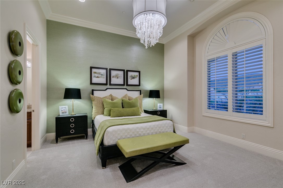 4 Awbrey Court Henderson, NV 89052 - Photo 48 of 72 Carpeted bedroom with a chandelier, ornamental molding, and ensuite bath